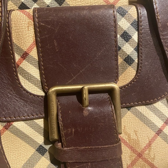 Burberry purse with browns leather straps and snap front with opening - Picture 11 of 13